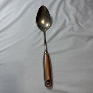vintage A&J Ekco chromium-plated serving spoon with a wood handle